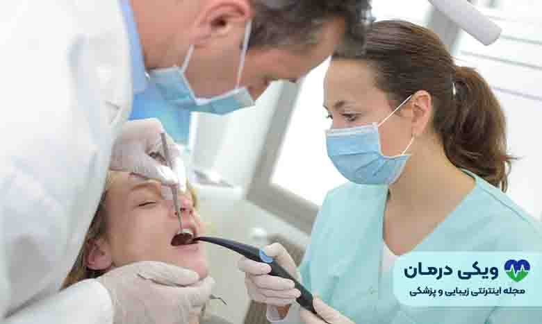 هزینه کشیدن دندان با دفترچه سلامت